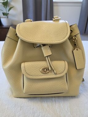 Coach Riya 21 Pebbled Leather Mini Backpack, Hay/Pale Yellow, Like New